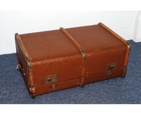 A vintage travel trunk, c1940s, the interior with lift out tray, having some applied labels, AF 