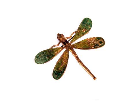 A vintage gilt metal and enamelled dragonfly brooch, naturalistically modelled with green painted wings and eyes and abdomen 
