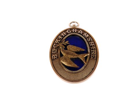 A George V silver gilt Masonic pendant by Spencer, marked to the front with BUCKINGHAMSHIRE having peace dove on blue enamel 