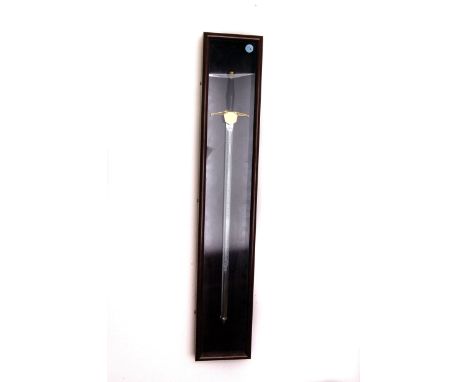 A presentation sword by Wilkinson,  etched along the blade 'International Hardware and Housewares Show 1989', in a presentati