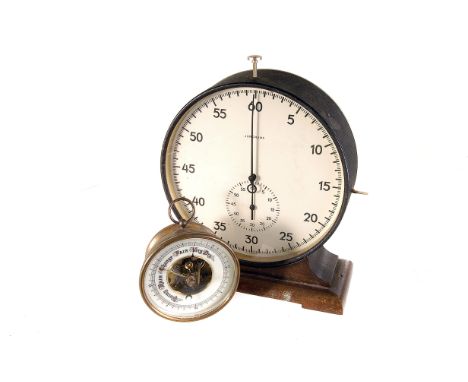 A group of timepieces,  to include an 8-day dashboard clock with black dial and white Roman numerals, a 1940s pin pallet dash