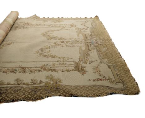 A 19th century French tapestry, the rectangular woven wall hanging panel depicting classical maidens and cherubs seated in a 