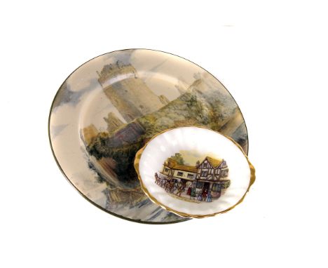 A Royal Doulton cabinet plate,  painted with Pembroke Castle, together with a collection of smaller plates, including two Roy