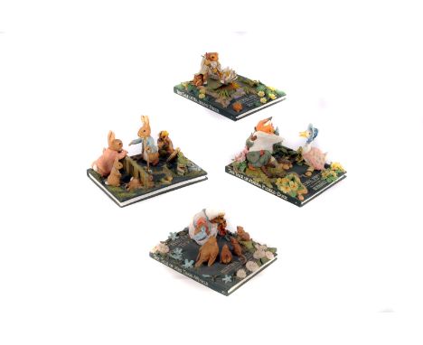 A collection of Frederick Warne & Co 'Beatrix Potter' ceramic ornaments,  realistically modelled as Beatrix Potter books surm