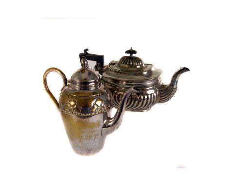 An electroplated three piece tea service,  with semi gadrooned body, including tea pot, twin handled sugar, and milk jug, tog