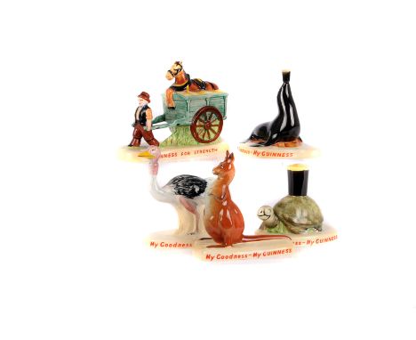 A set of seven Carltonware 'Guinness' advertising figures,  various models, including two toucans and a pint balancing sea-li