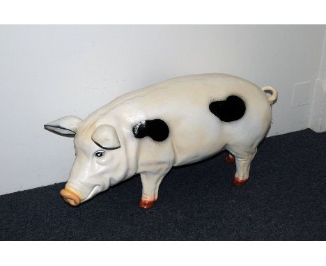 A large modern fibreglass model of a pig, possibly a shop display and modelled as a Gloucestershire Old Spot, approx. 100cm 