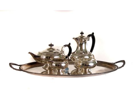 An electroplated four piece tea service by Mappin & Webb,  of circular form, with gadrooned border, together with twin handle