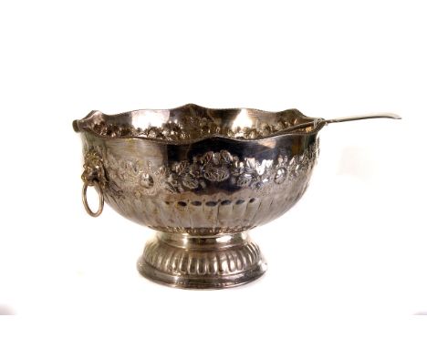 A silver plated punch bowl,  semi gadrooned, with lion mask ring handles, 33cm diameter, together a plated ladle (2) 