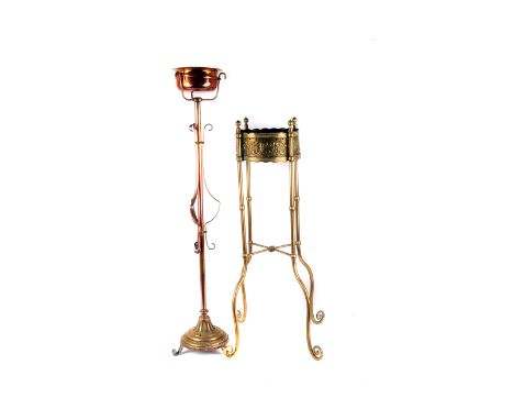 A Continental brass standing planter,  68cm high, together with another in copper, and a collection of brass and metal ware, 
