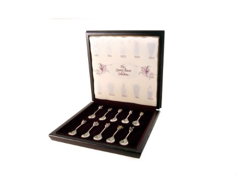 A limited edition boxed set of silver and enamel Queen's Beasts Commemorative spoons, the square case with silver plaque cont