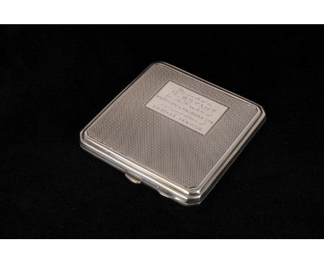 Of Huntley & Palmers interest: A George VI silver presentation compact, the square engine turned form having engraved inscrip