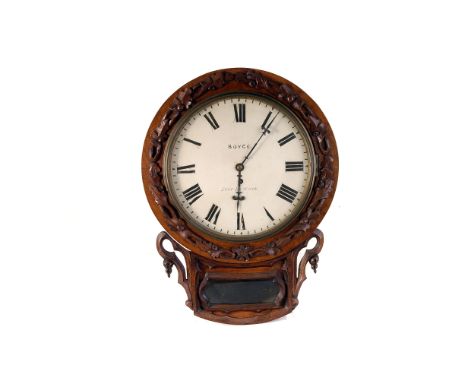 An oak drop-dial wall clock,  with heavily carved oak leaf and acorn design, signed Boyce, East Derehan, with a single train 