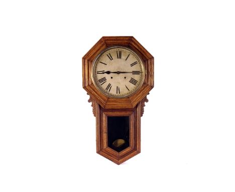 An American oak drop dial wall clock by Ansonia,  with paper dial, in oak case  