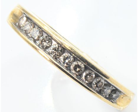 9ct gold &amp; diamond half hoop ring, London hallmarks, the diamonds together stated to weigh .25 carat, size N1/2, gross we