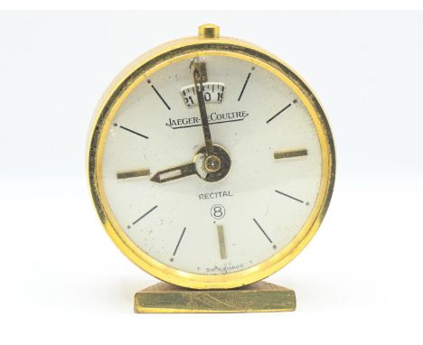 Jaeger-LeCoultre Recital 8-day travel alarm clock, th silvered dial with gilt and black baton marks and calendar aperture, he