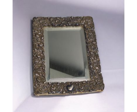 Late Victorian/Edwardian silver framed bevelled mirror, CAC, Birmingham 1900, 24 x 18cm, lossesLosses to backing, edges and e