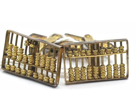 Pair of 14ct gold abacus cufflinks, marked 14K, face dimensions 20 x 12mm, gross weight 7 gramsAbacus' slightly misshapen