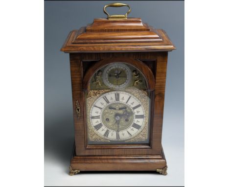 C18th bracket clock by Jon Crampton, Dublin. Subsidiary inscribed 'Full Sea at Dublin' and flanked by two putti figures over 