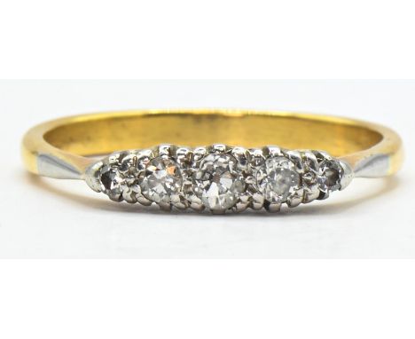Yellow metal and five stone diamond ring, tests positive for 18ct gold, size O1/2, gross weight 2.67 grams