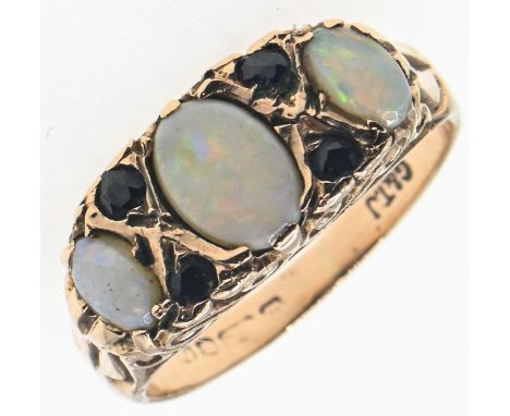 9ct gold, opal and blue stone ring, blue stone tested as spinel, Birmingham hallmark, size L1/2, gross weight 3.2 gramsRubbin