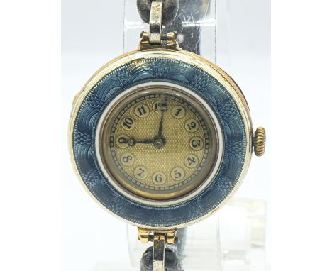 Grand Prix ladies 18ct gold and enamel cased watch, engine-turned gilt coloured dial with Arabic numerals, case back hallmark