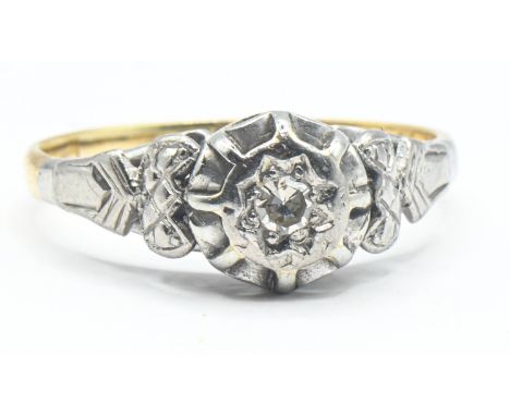 Yellow and white metal mounted single diamond ring, size O, gross weight 3.2 grams