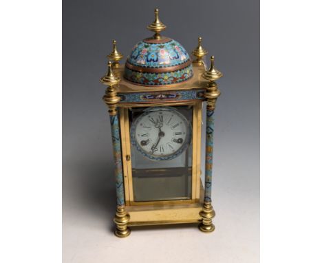 A French champlevé enamel and gilt brass portico clock, with domed top and enamelled panels with figurative decor to sides, w