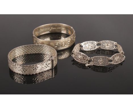 Three silver bracelets. Includes bangle, filigree example and one other. 84.63g  