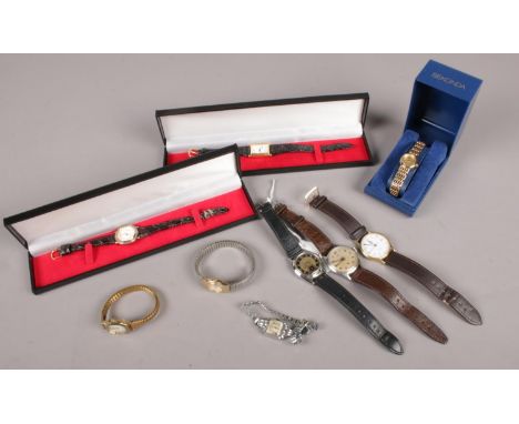 A box of wristwatches. Includes two gents manual examples and seven ladies dress watches.  