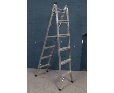 A pair of Aluminium step ladders. H: 189cm.  Condition good.