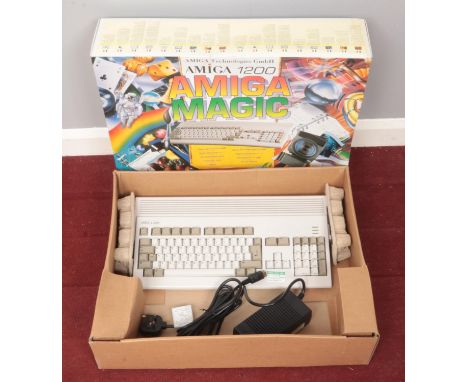 A Commodore Amiga 1200 in original Magic Pack box.  Has PAT tested label for April 2021.