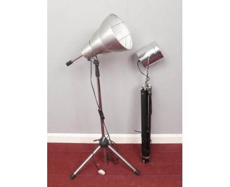 Two contemporary tripod lights. Both lights are adjustable.  Condition fair. The chrome light is missing a plug. Both unteste