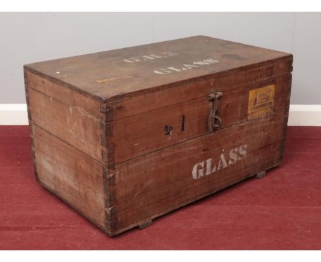 A vintage wooden trunk. Stencilled G.H.R Glass, bearing label for Elder Dempster Lines Liverpool, Baggage Room.  
