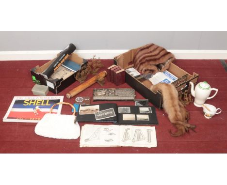 Two boxes of miscellaneous. To include a vintage Meccano set with manual, a photograph album with  family holiday trips from 
