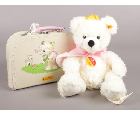 A Steiff teddy bear 'Lotte' with suitcase. 28cm height.  