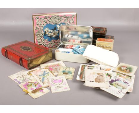 A group of assorted collectables. Early 20th Century Christmas &amp; greeting cards, vintage postcards, vintage advertising m