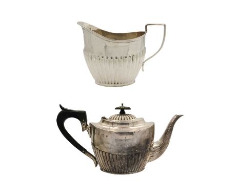 A Victorian silver half fluted two piece tea set by Barker Bros. Birmingham 1900, ebonised handle and finial, width 27cm, the