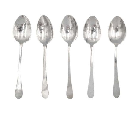 A set of five silver teaspoons by Gwen Whicker. With flattened tapering handles and hammered oval bowls, hallmarked London 19
