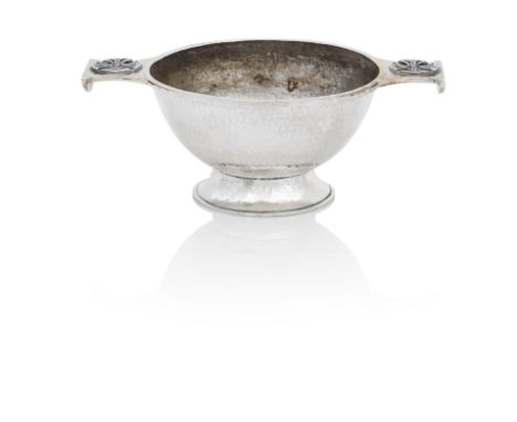 Sybil Dunlop, A George V QuaichLondon, 1933 Of typical form and with hammered surface, each handle with applied Celtic cross 