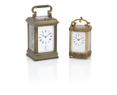 A French lacquered brass carriage clocklate 19th century,the case with moulded borders the white enamel dial with Roman chapt