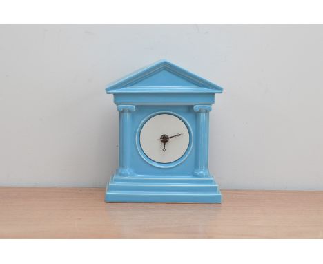 A late 20th century blue glazed porcelain mantle clock, in the neoclassical style, 21cm high
