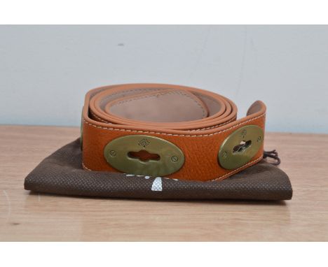 An apparently unused Ladies Mulberry Belt, light brown leather, marked 44/100, in a Mulberry retail bag