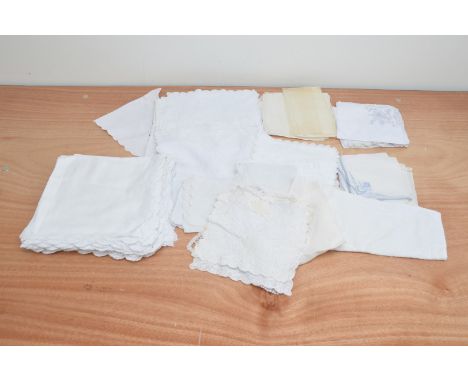 A large collection of assorted lace, comprising napkins a tablecloth etc (qty)