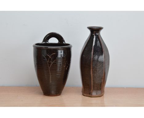 A stoneware tenmoku glazed vase by Marianne de Trey, impressed mark towards the base, 25cm high, together with a brown glazed