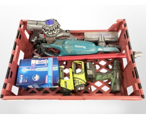 A group of power tools including Ryobi, Makita, Dyson vacuum, electric toothbrush, etc (1 box)