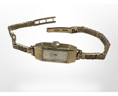 A 9ct yellow gold lady's Rotary wristwatch with full gold strap CONDITION REPORT: 12.1g.