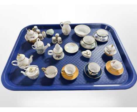 A collection of Caverswall and Spode miniature tea china, porcelain thimbles, etc 