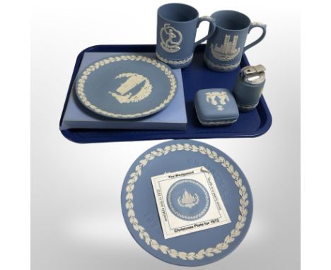 Two Wedgwood blue and white Jasperware Christmas plates, pair of tankards, a table lighter, and a Charles and Diana trinket b