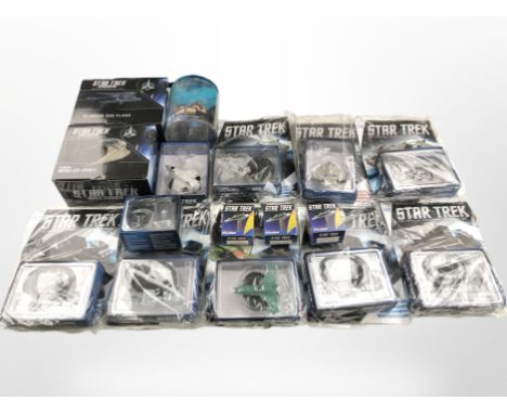 A quantity of Star Trek collectibles including official Starship Collection models with accompanying magazines, light-up phas